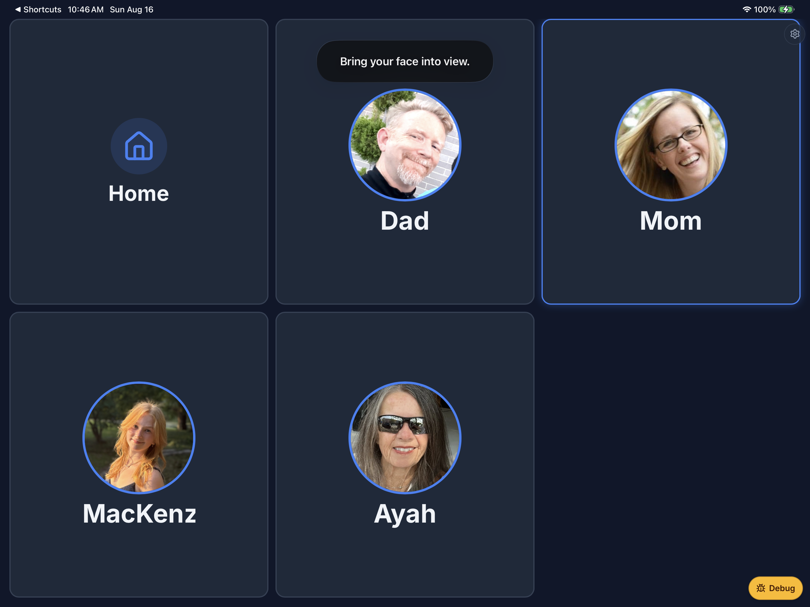 EnableText Home with large tiles for Home, Dad, Mom, MacKenz, and Ayah. Mom is highlighted.
